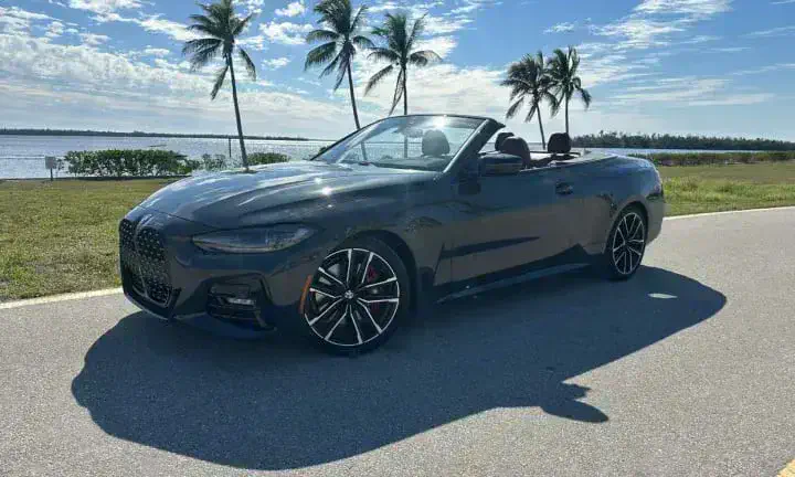 2022 BMW 430i convertible rental vehicle, top down, Southwest Florida waterfront