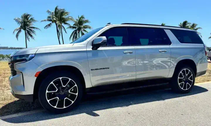 2023 Chevrolet Suburban rental vehicle in silver, Southwest Florida coastline