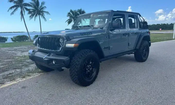 2025 Jeep Wrangler Willys rental vehicle, top off, Southwest Florida coastline